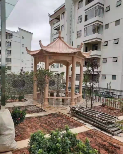 小區(qū)園林石涼亭，晚霞紅大理石石雕亭子
